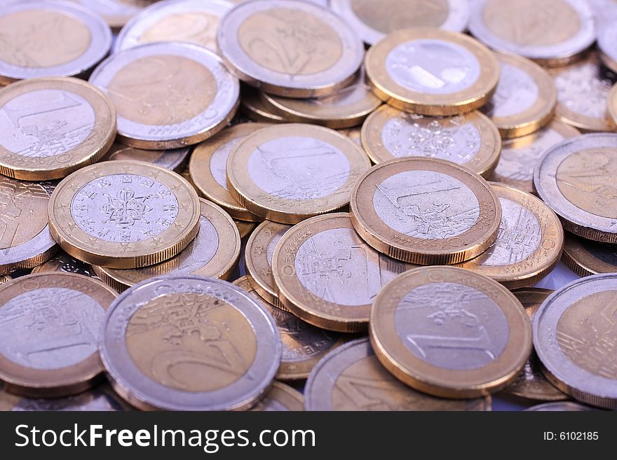 A macro of a large amount of the European coins. A macro of a large amount of the European coins.