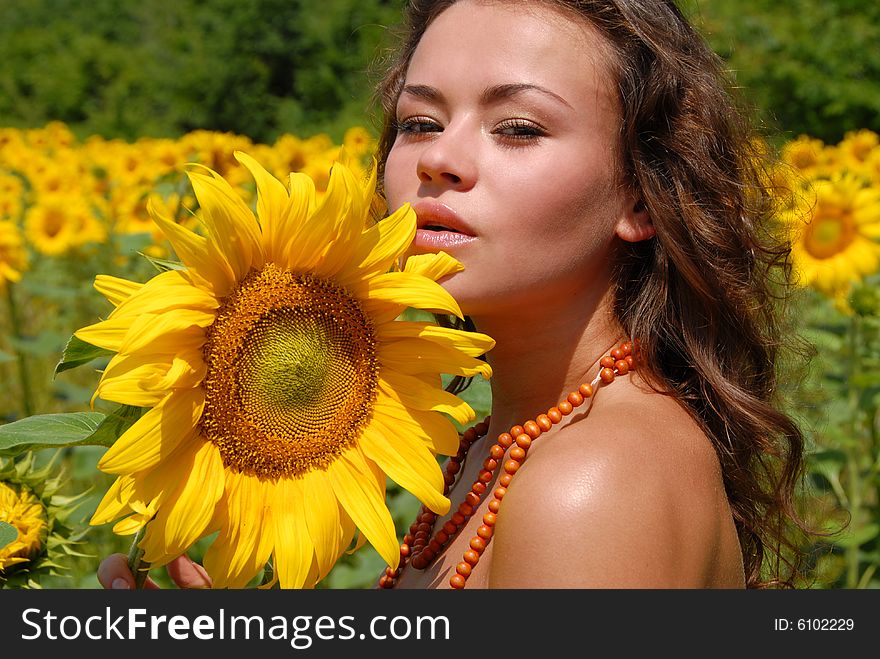 Portrait of the beautiful girl with flowers. Portrait of the beautiful girl with flowers