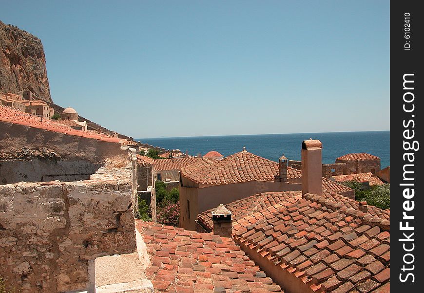 Greece, travel, medieval, castle, resort, seaside, Monemvasia, Peloponnese, tourism, ceramic tiles, roof. Greece, travel, medieval, castle, resort, seaside, Monemvasia, Peloponnese, tourism, ceramic tiles, roof