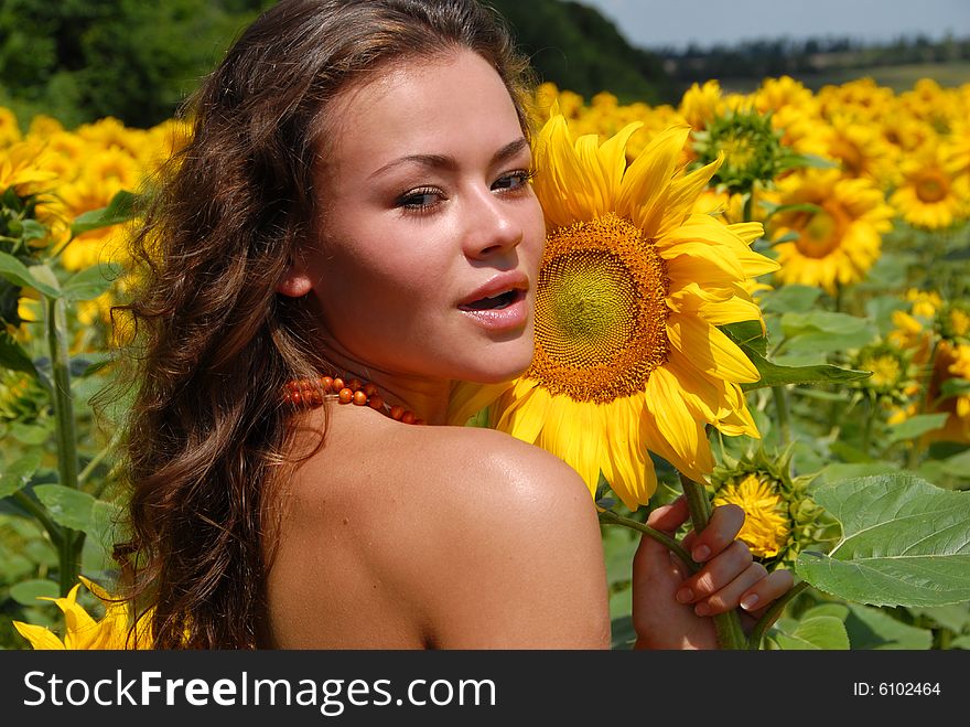 Portrait of the beautiful girl with flowers. Portrait of the beautiful girl with flowers