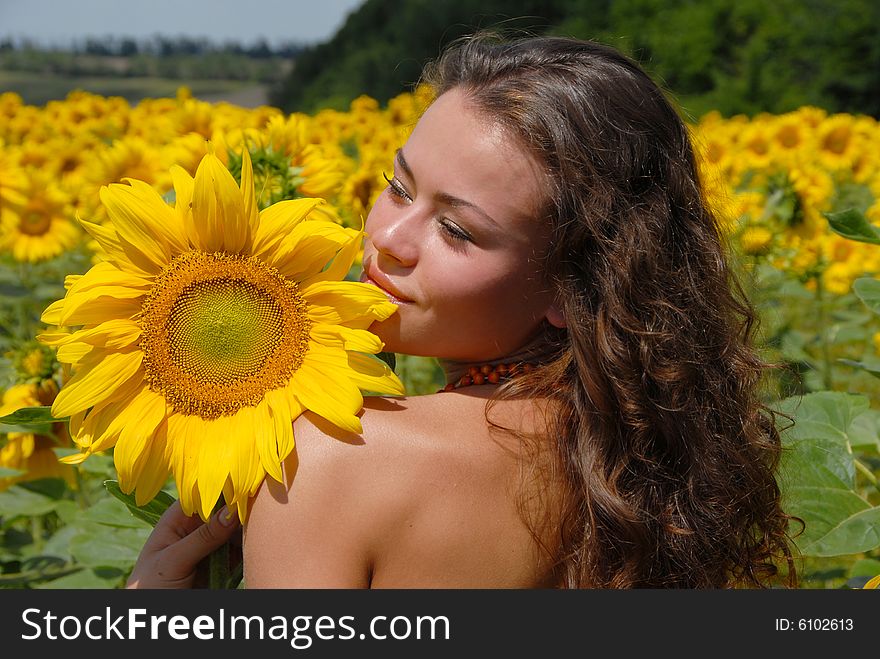 Portrait of the beautiful girl with flowers. Portrait of the beautiful girl with flowers