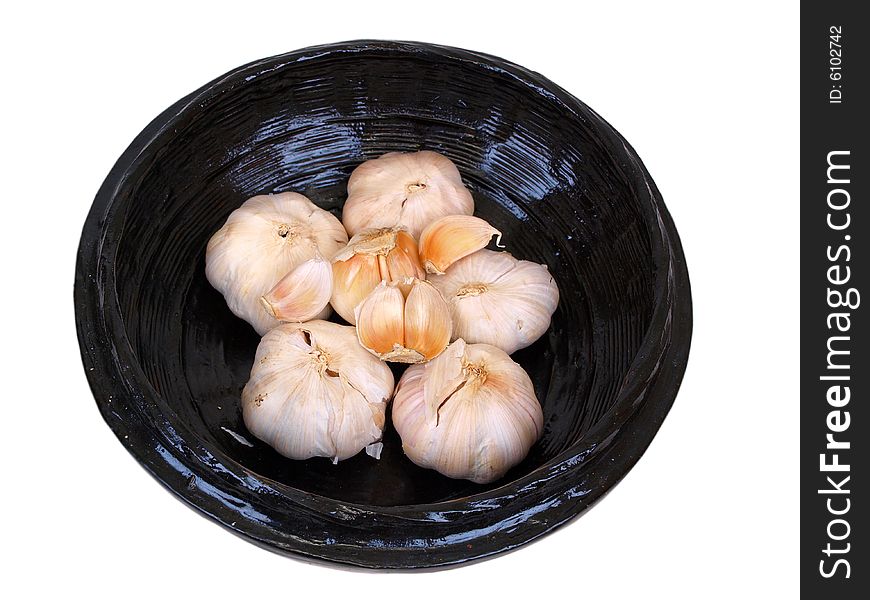 Garlic wholes & peels in wooden Black Bowl. Garlic wholes & peels in wooden Black Bowl
