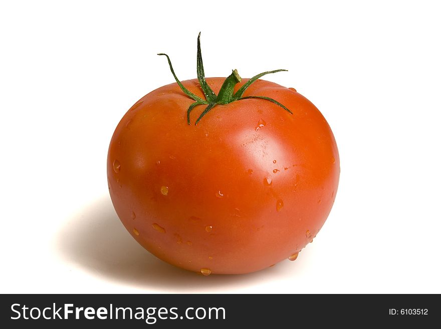 Fresh tomato on white ground