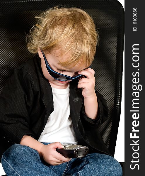 Little boy calling by mobile phone. Little boy calling by mobile phone