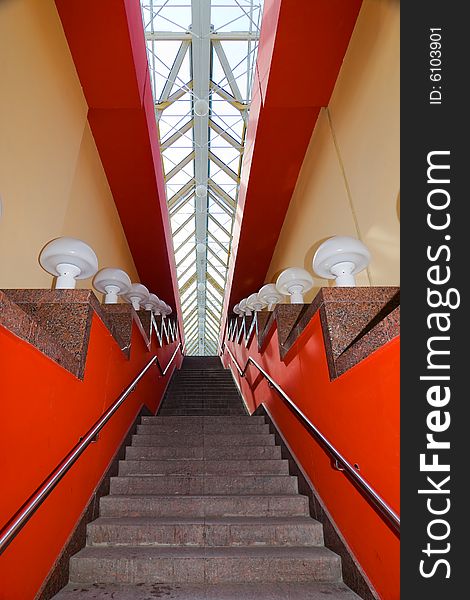 Indoor urban staircase with lamps