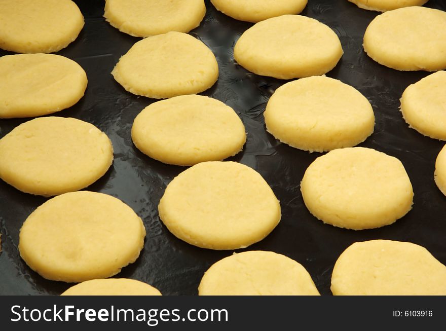 House cookies prepared before a batch as a new background. House cookies prepared before a batch as a new background