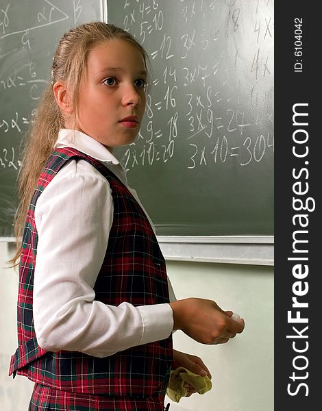 Schoolgirl At The Blackboard