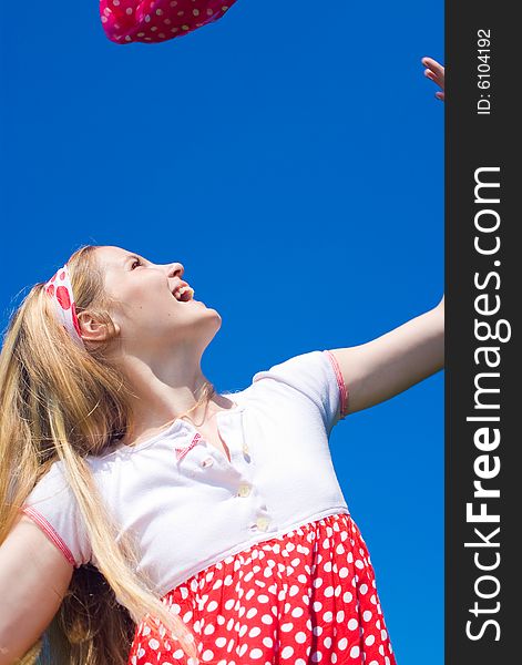 Expressive young girl on blue sky background. Expressive young girl on blue sky background