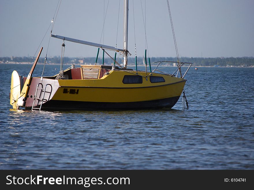 Lonely yacht in the bay