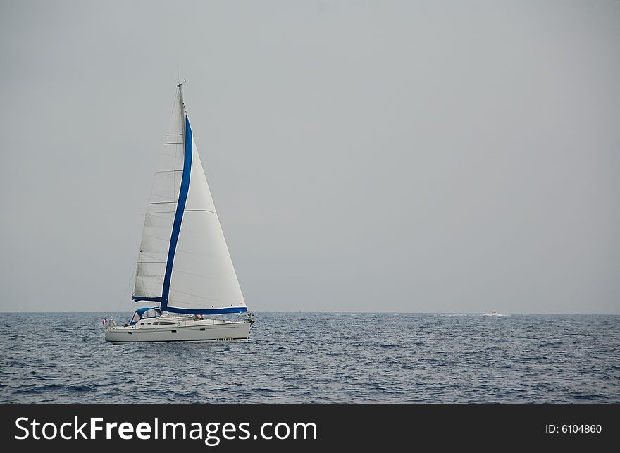 Sailboat sailing along in France. Sailboat sailing along in France