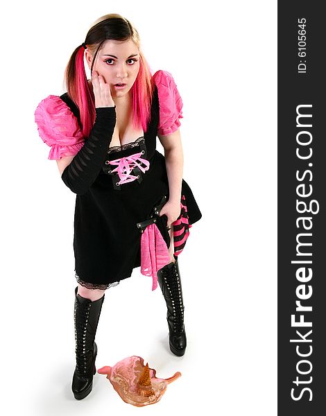 Beautiful 17 year old teen with pink, brown, blonde hair in goth style dress with melting icecream. Beautiful 17 year old teen with pink, brown, blonde hair in goth style dress with melting icecream.