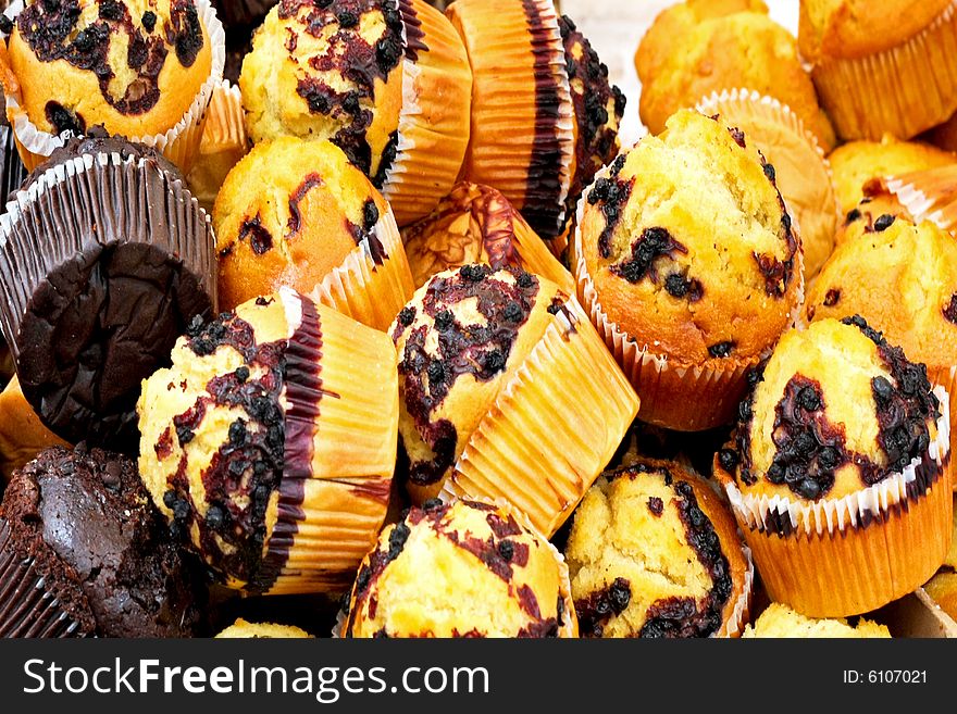 Bunch of fresh blueberry and chocolate muffins