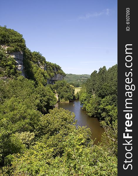 Canoe on the Vezere river in the Dordogne, France, by la Roque St Christophe