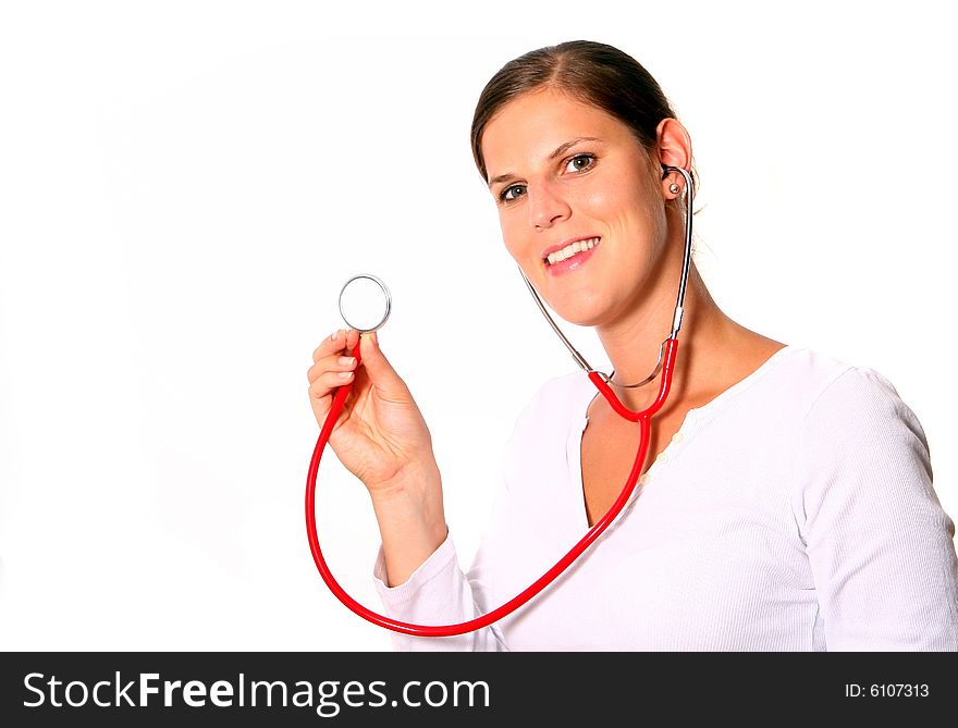 A young female doctor with a stethoscope around the neck! Isolated over white. A young female doctor with a stethoscope around the neck! Isolated over white.