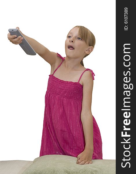 Little girl pushing button on remote control