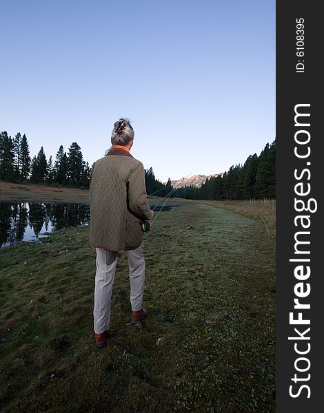 Senior woman looking at lake. Senior woman looking at lake