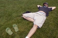 Man Resting In Grass Stock Photography Man Resting In Grass Stock Photography