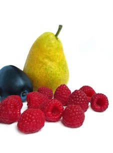 Raspberry, Plum And Pear Royalty Free Stock Photography