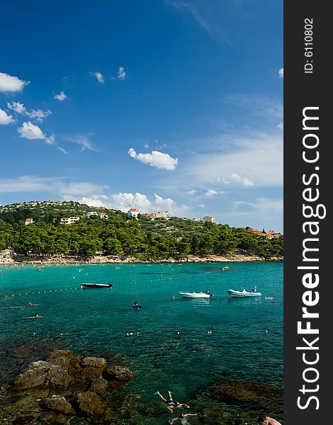 Adriatic sea beach in Croatia full of tourists. Adriatic sea beach in Croatia full of tourists