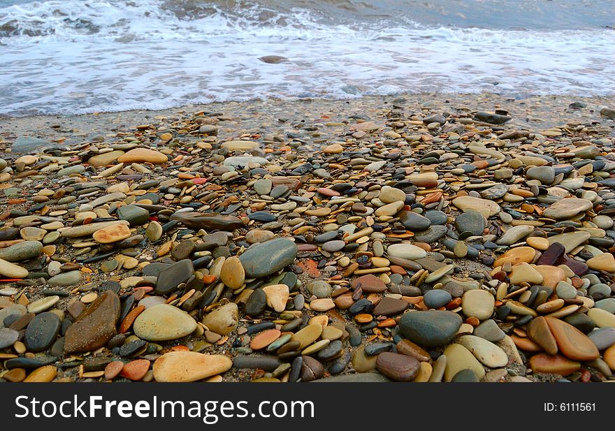 Closeup of sea shore covered with pebbles. Closeup of sea shore covered with pebbles