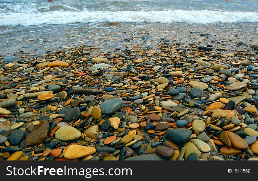 Closeup of sea shore covered with pebbles. Closeup of sea shore covered with pebbles