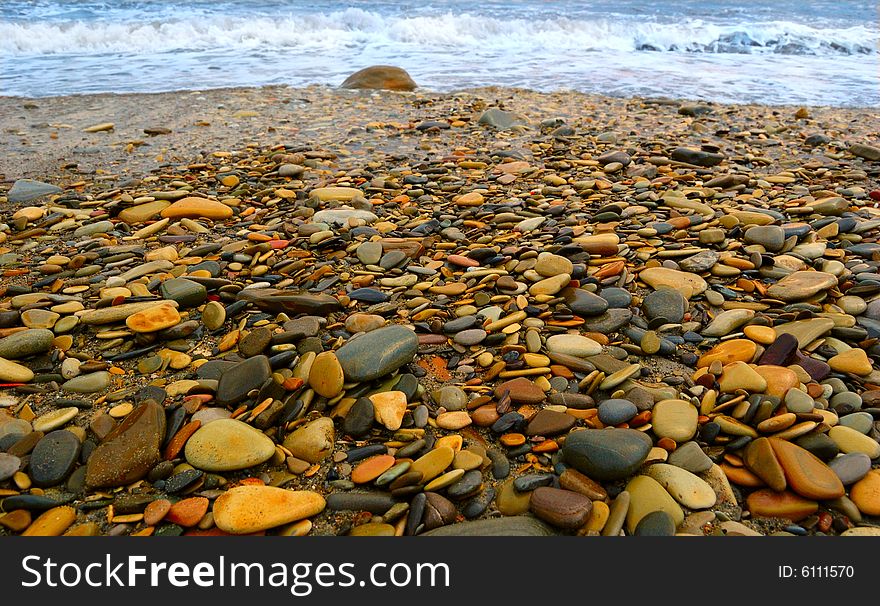 Closeup of sea shore covered with pebbles. Closeup of sea shore covered with pebbles