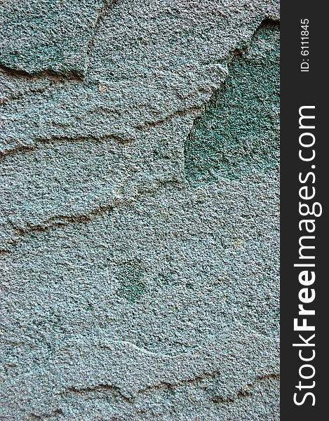 Colored (prevaling blue) rough stone surface