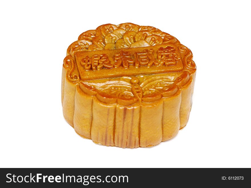 Close up of a mooncake over white background.