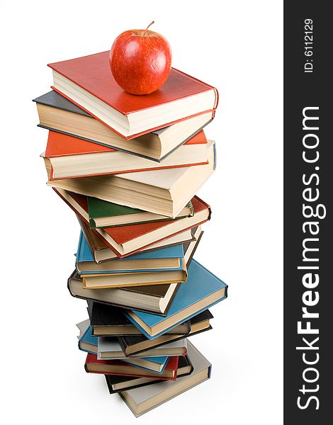 Pile of books and apple isolated on a white background. Concept for Back to school. Clipping path included.
