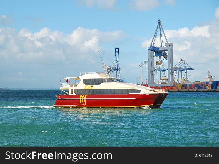 yacht sailing with ship yard background