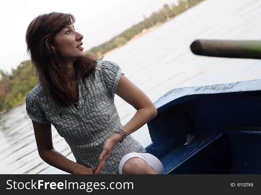 A beautiful lady alone on the boat. A beautiful lady alone on the boat