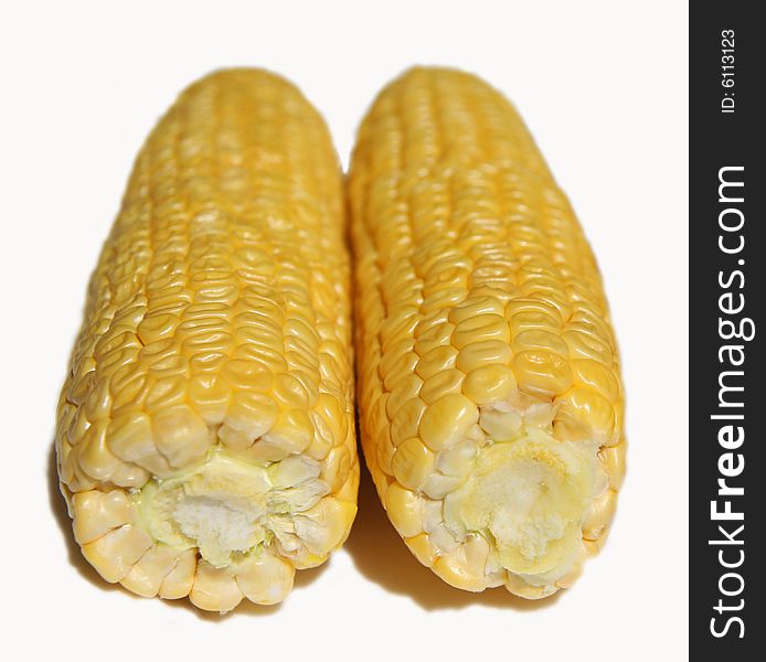 Two corn cob isolated on a white background. Two corn cob isolated on a white background.