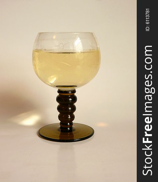 A close up view of a glass of white wine