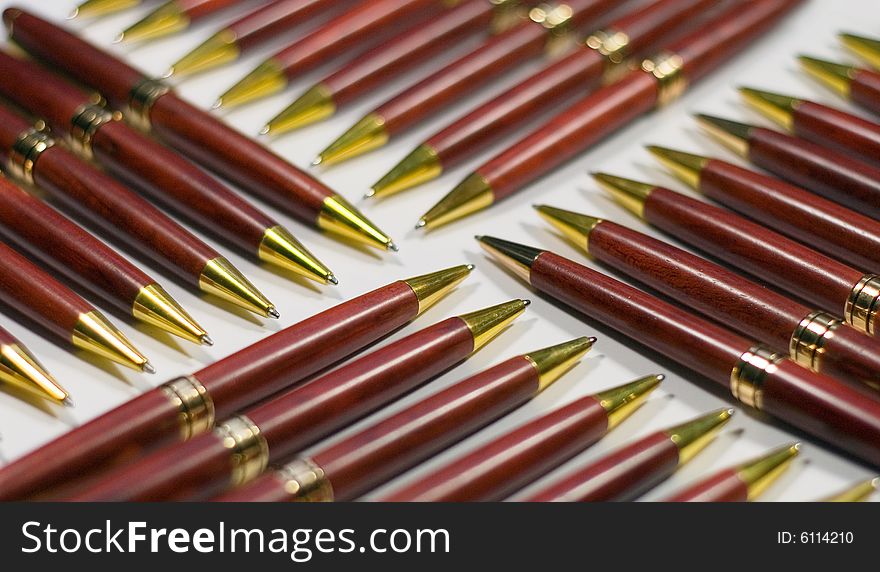 Wooden pens with a gold clip