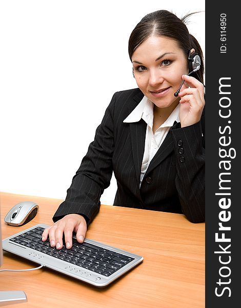 Attractive brunette woman in office with headphone. Attractive brunette woman in office with headphone