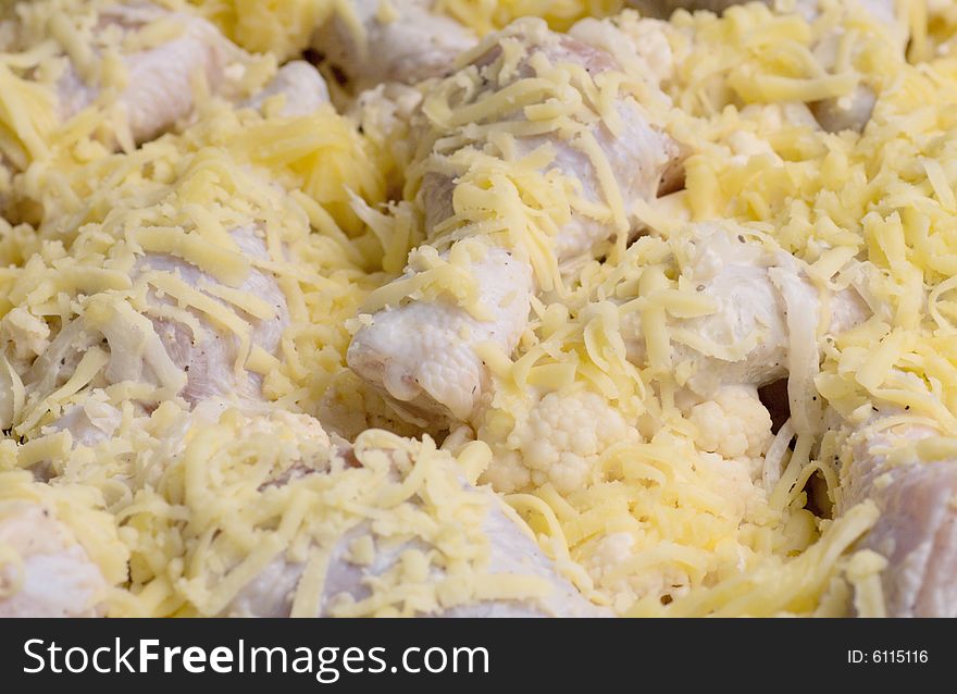 Marinated chicken before baking with vegetables and cheese (series, recipe N1)
