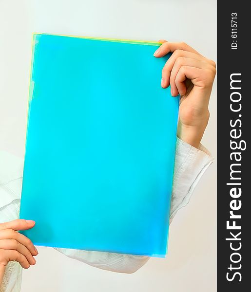 Women hands holding office folders. Women hands holding office folders