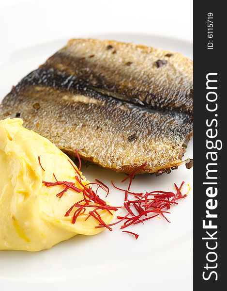 Grilled fish with mashed potatoes typical food from Chech republic
