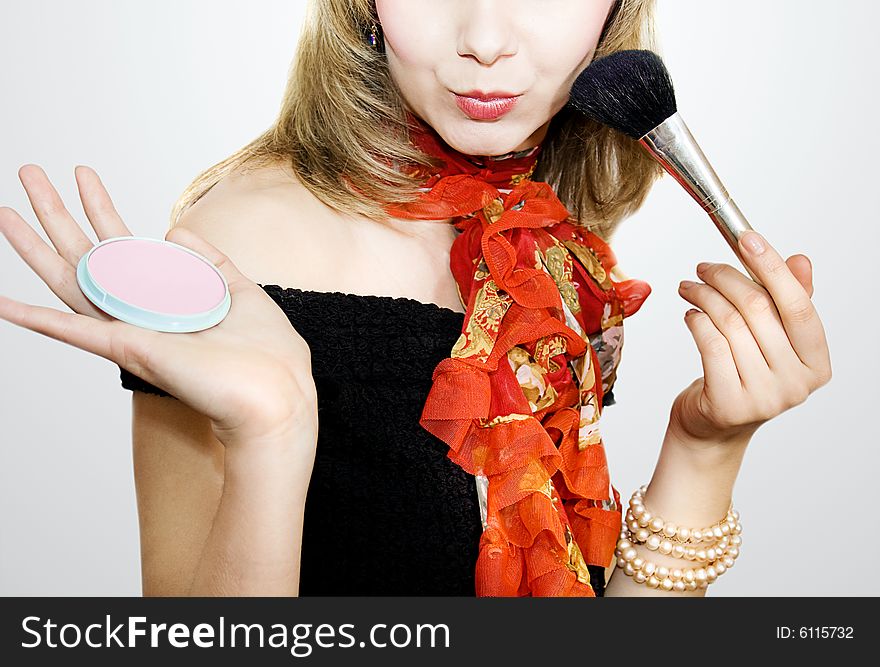 Beauty girl with make-up brush