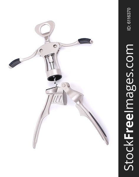 A doll consist of corkscrew and garlic press on white background