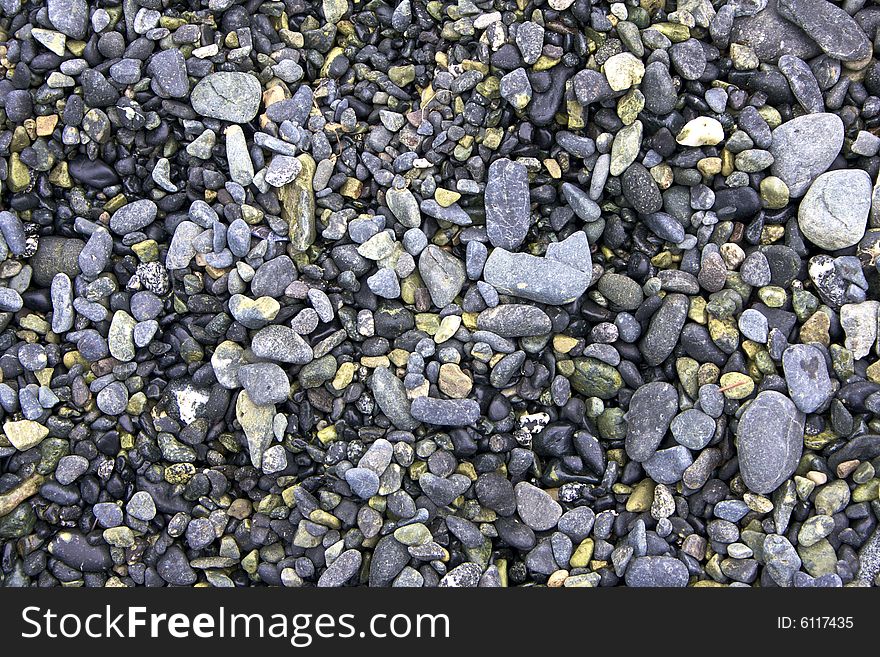 Smooth pebbles and stones on the shore. Smooth pebbles and stones on the shore