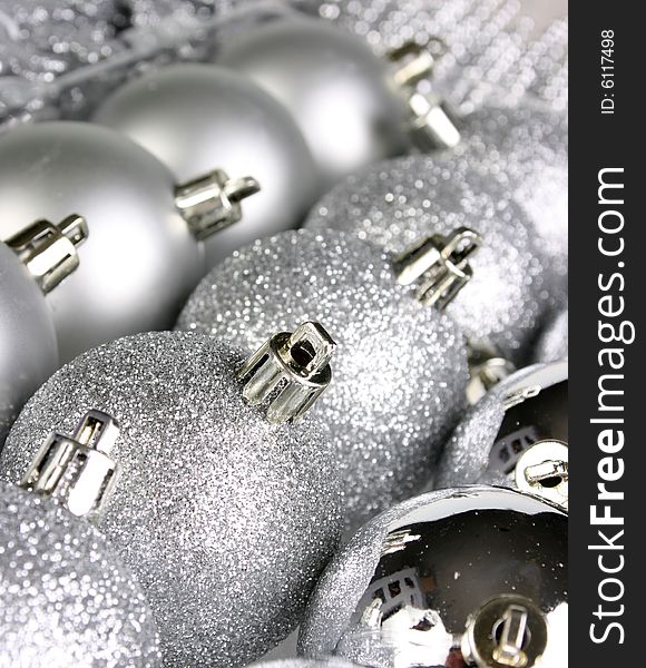 Selection of silver christmas ornament lined up. Selection of silver christmas ornament lined up