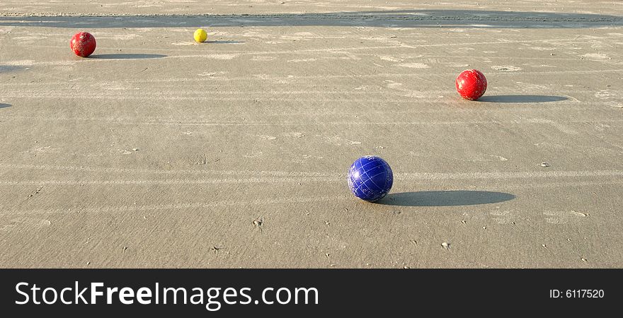 Boccie balls on the beach