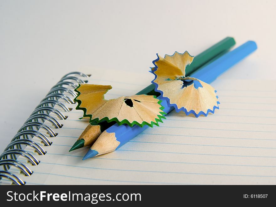 Closeup of colored crayons on white background