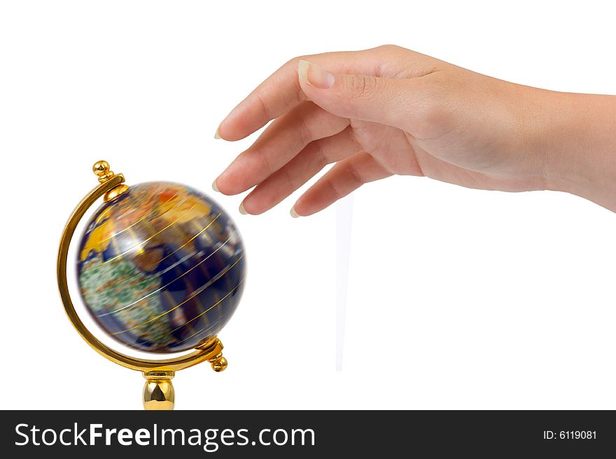 Hand and spinning globe isolated on white background