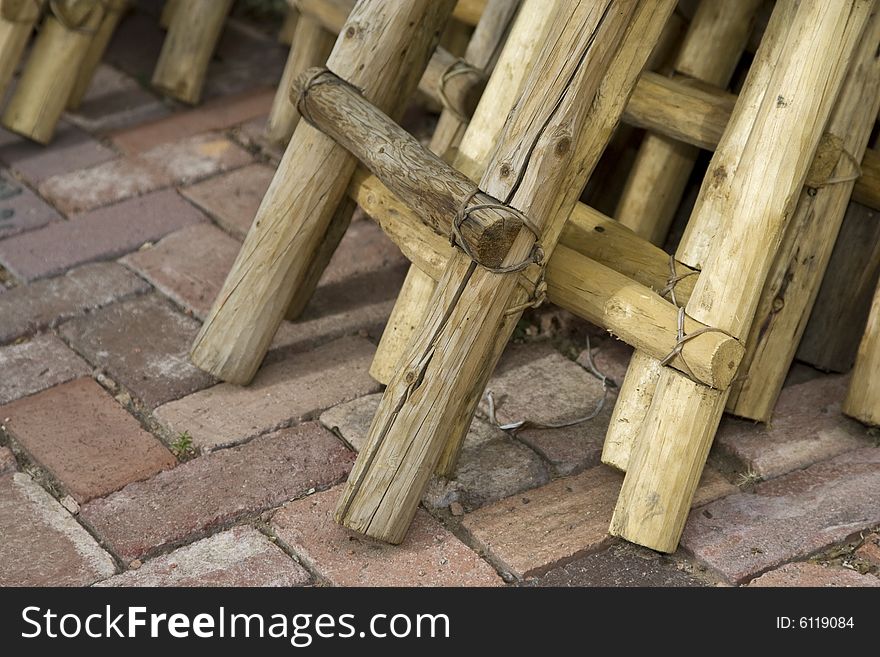 Mexican ladders stored on a brick patio. Mexican ladders stored on a brick patio.