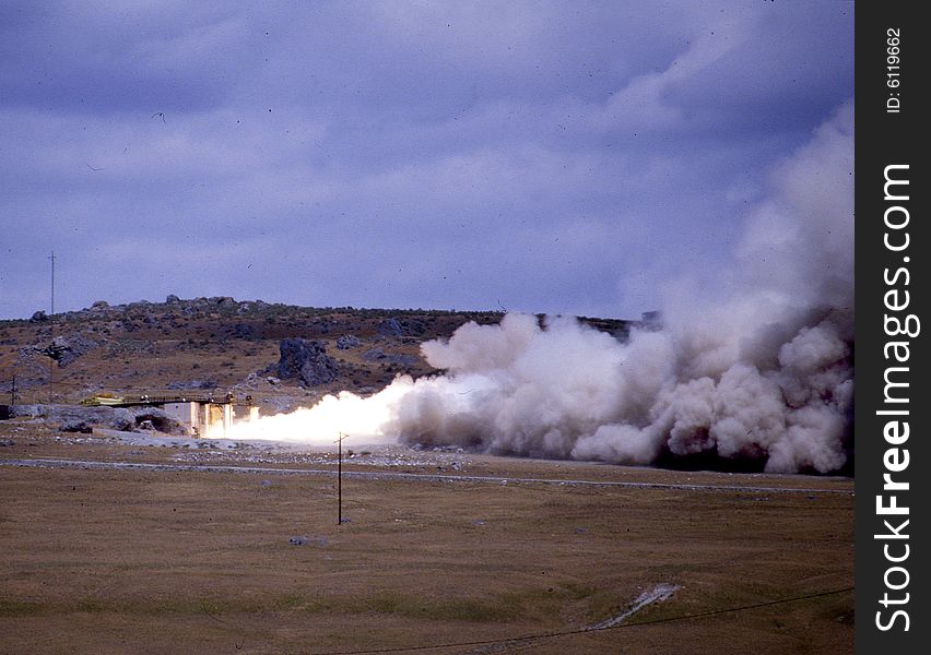 Booster rocket testing at Thiokol for a motor that will propel the space shuttle. Booster rocket testing at Thiokol for a motor that will propel the space shuttle.