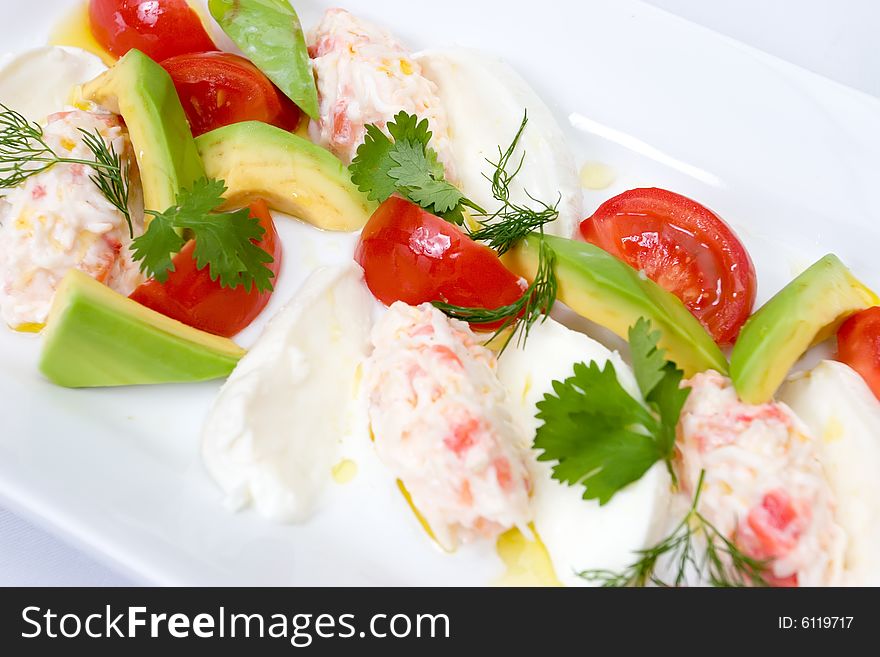 Refined food from a restaurant on a white plate. Refined food from a restaurant on a white plate