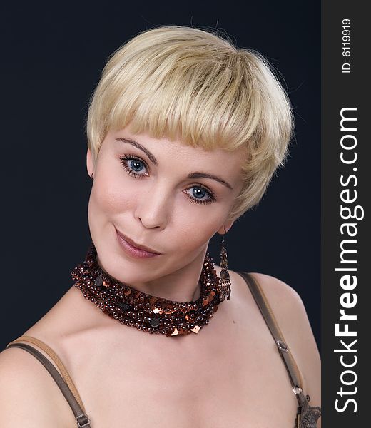 Blonde woman with necklace.