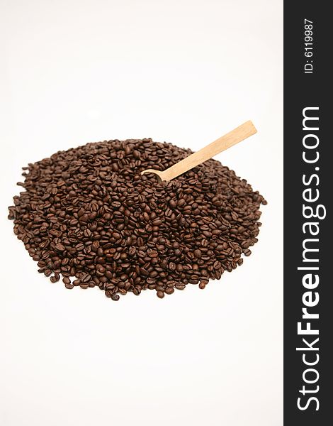 Timber spoon and coffee beans